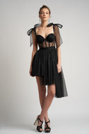 Asymmetrical dress with transparent corset