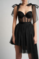 Asymmetrical dress with transparent corset