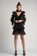 Black mini dress with tulle ruffles and deep neckline