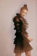 Black mini dress with tulle ruffles and deep neckline