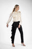 Pantaloni conici cu volan asimetric