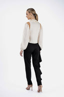Pantaloni conici cu volan asimetric