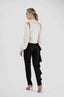 Pantaloni conici cu volan asimetric