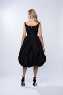 Black midi dress with white flower applique
