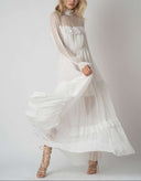 Rochie lunga  cu volane  si guler inalt cu design feminin, croiala moderna si detalii statement Monarh Design