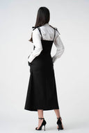 Sarafan negru midi cu buzunare laterale cu design feminin, croiala moderna si detalii statement Monarh Design