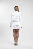 Fusta mini cu volan si detalii metalice cu design feminin, croiala moderna si detalii statement Monarh Design