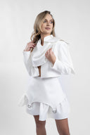 Fusta mini cu volan si detalii metalice cu design feminin, croiala moderna si detalii statement Monarh Design