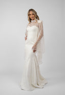 Mermaid dress with accessorized embroidery and flared sleeves