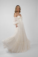Rochie diafana cu volum spectaculos