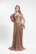 Long dress in film-coated silk tulle with gathered bodice and flowing sleeves