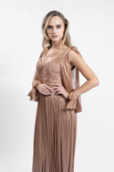 Long dress in film-coated silk tulle with gathered bodice and flowing sleeves