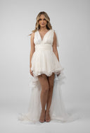 Dress with long detachable skirt and dramatic ruffles