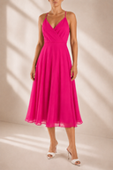 Rochie midi  cu bretele subtiri si decolteu petrecut Fucsia